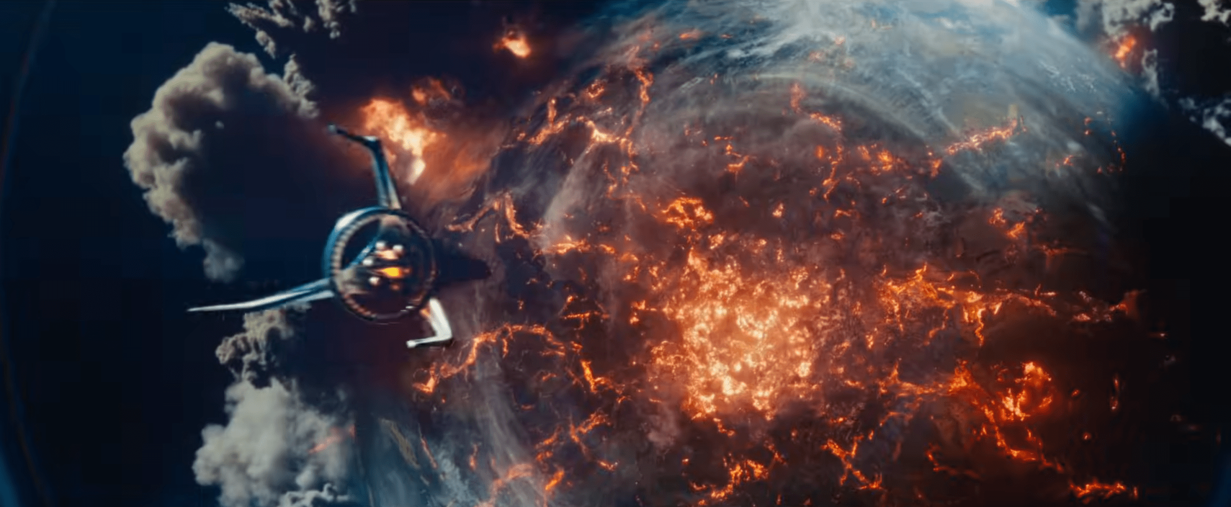 A screenshot of the Fantastic Four rocket flying at a molten Earth, in a still from the Fantastic Four: First Steps trailer