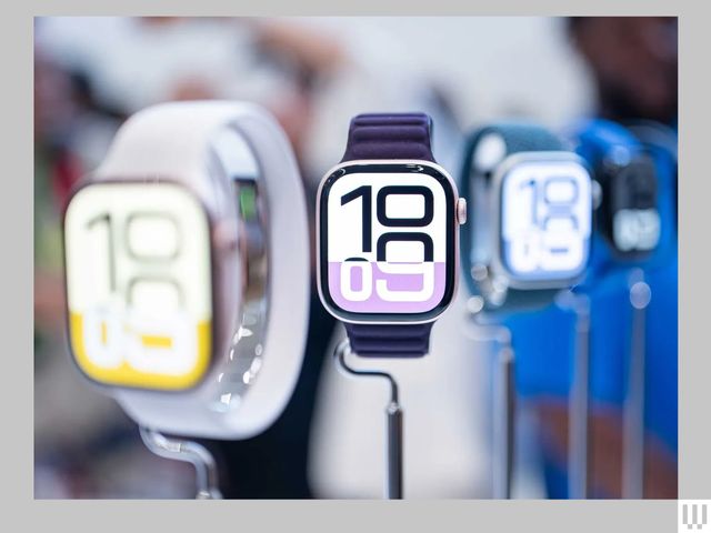 A row of smart watches on narrow stands